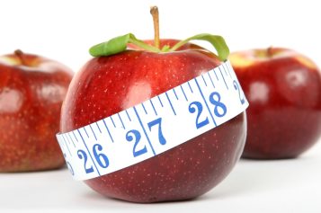 Diet - apple and measuring tape